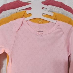 NWT 4 Pack of Carter's Baby Long Sleeves Onesies Size 9 months